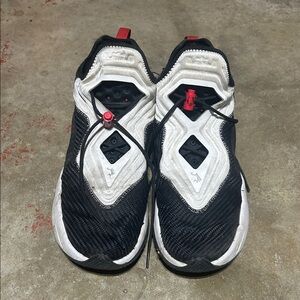 Nike Black and White Athletic Shoes with Red Accents